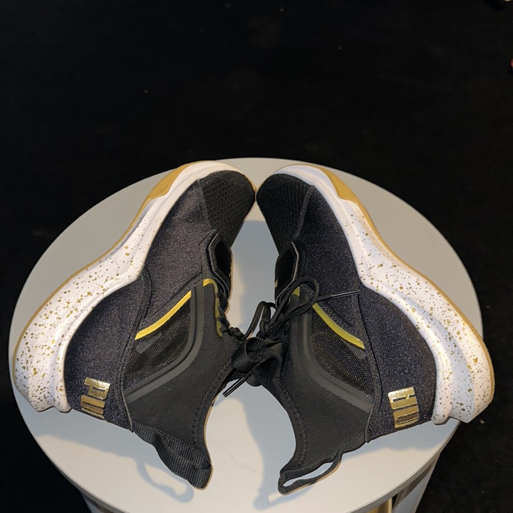 PUMA Women's Phenom Gold Wn Sneaker Black - Picture 6 of 9